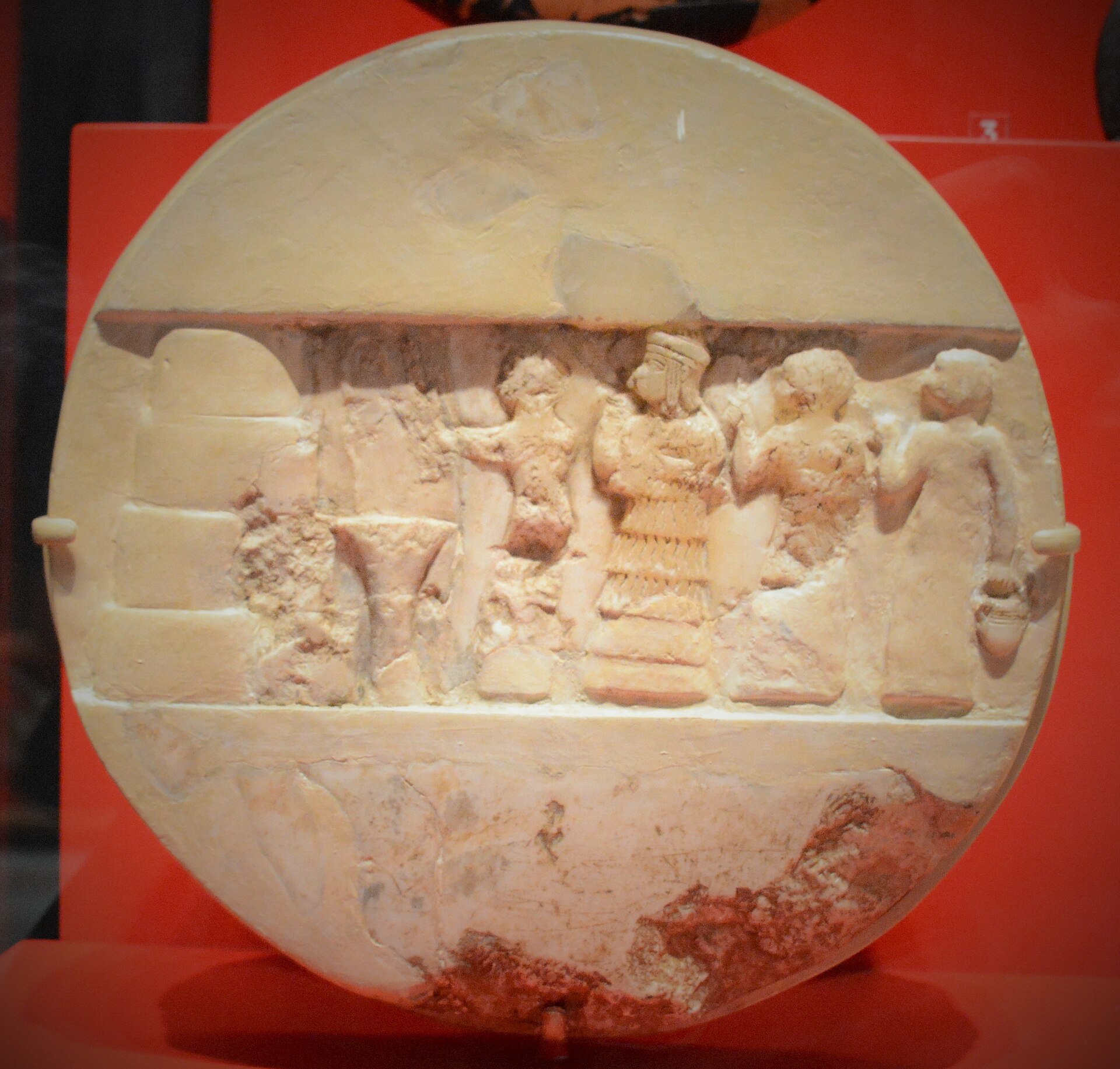 The Disk of Enheduanna, limestone relief from Ur, Penn Museum.