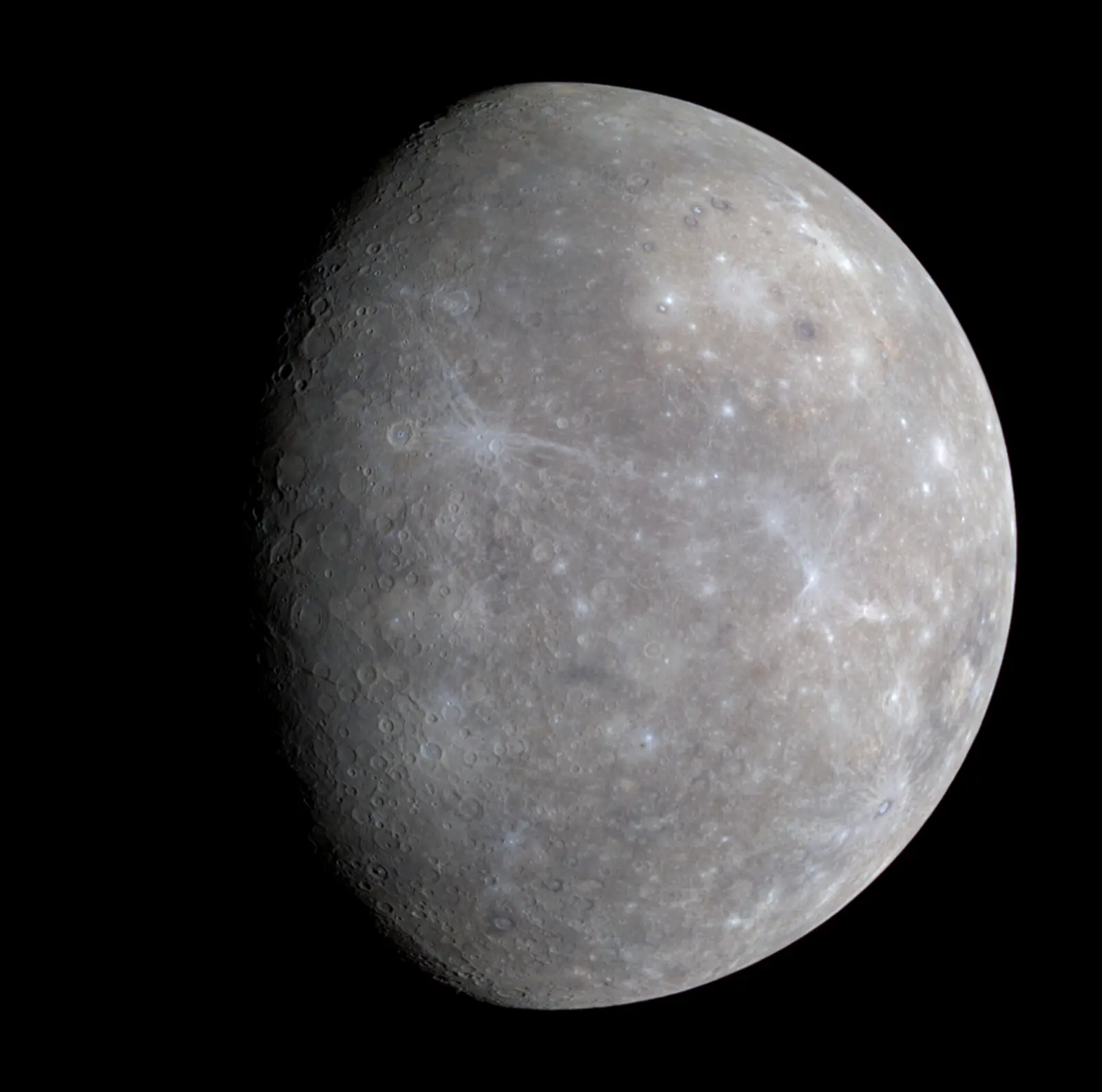 Mercury in true color, a gray world with a thin rocky surface.