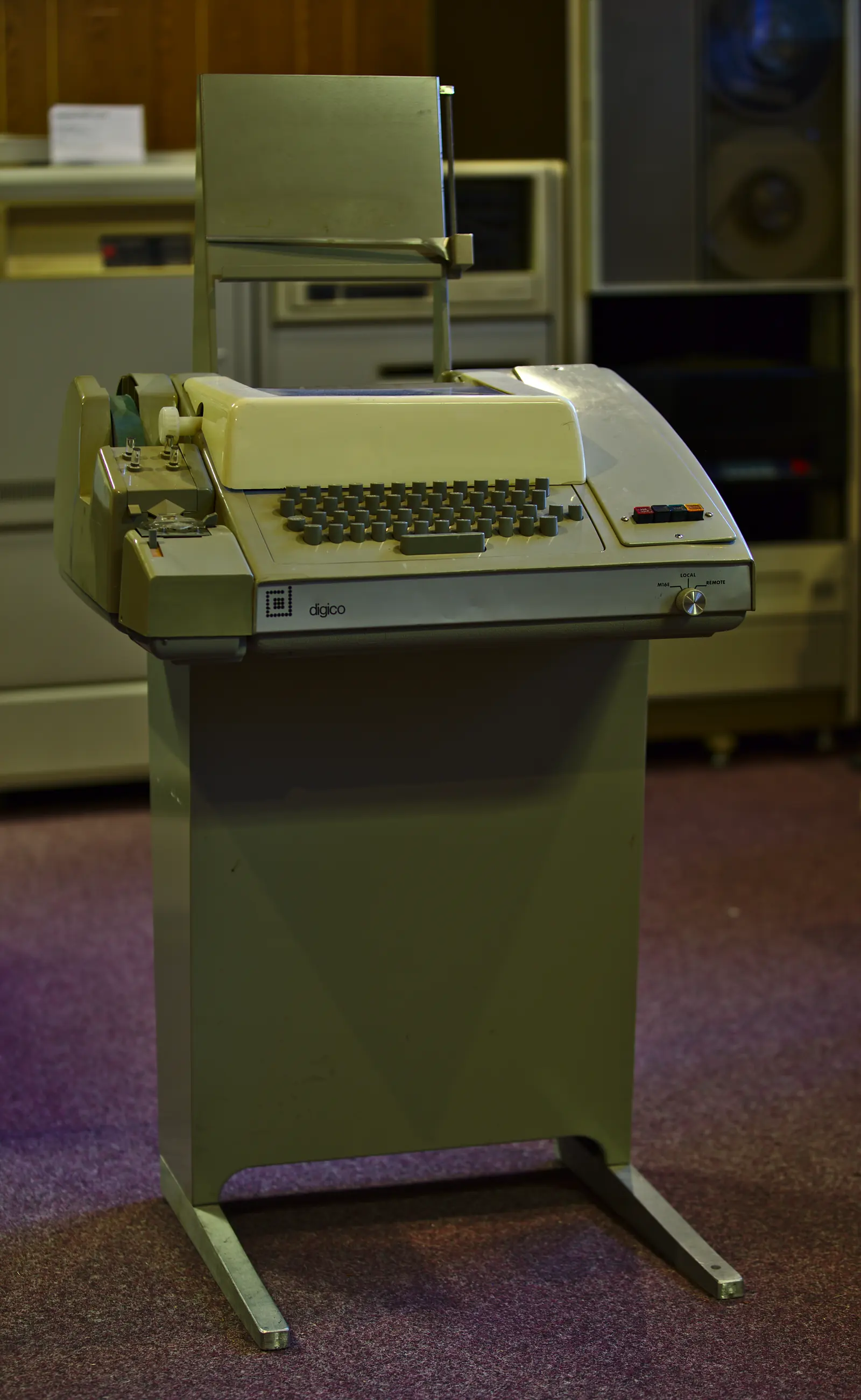 A Teletype Model 33 ASR terminal from 1968, beige keyboard and printer with paper tape punch, the machine of early ARPANET messages.