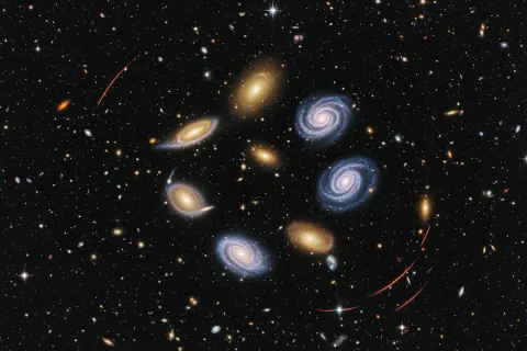 The words 42,000 and DIVINE YEARS on a dark star field.