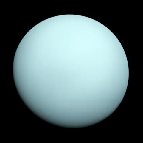Uranus as Voyager 2 saw it, a pale cyan world in sunlight.