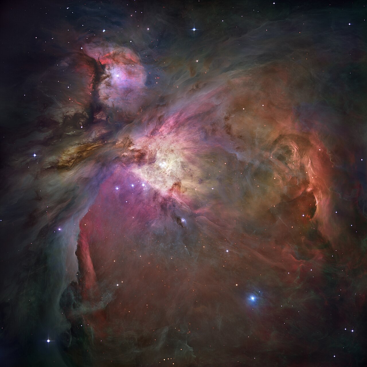 Hubble mosaic of the Orion Nebula, Messier 42: a cavern of glowing gas and dust with young stars.